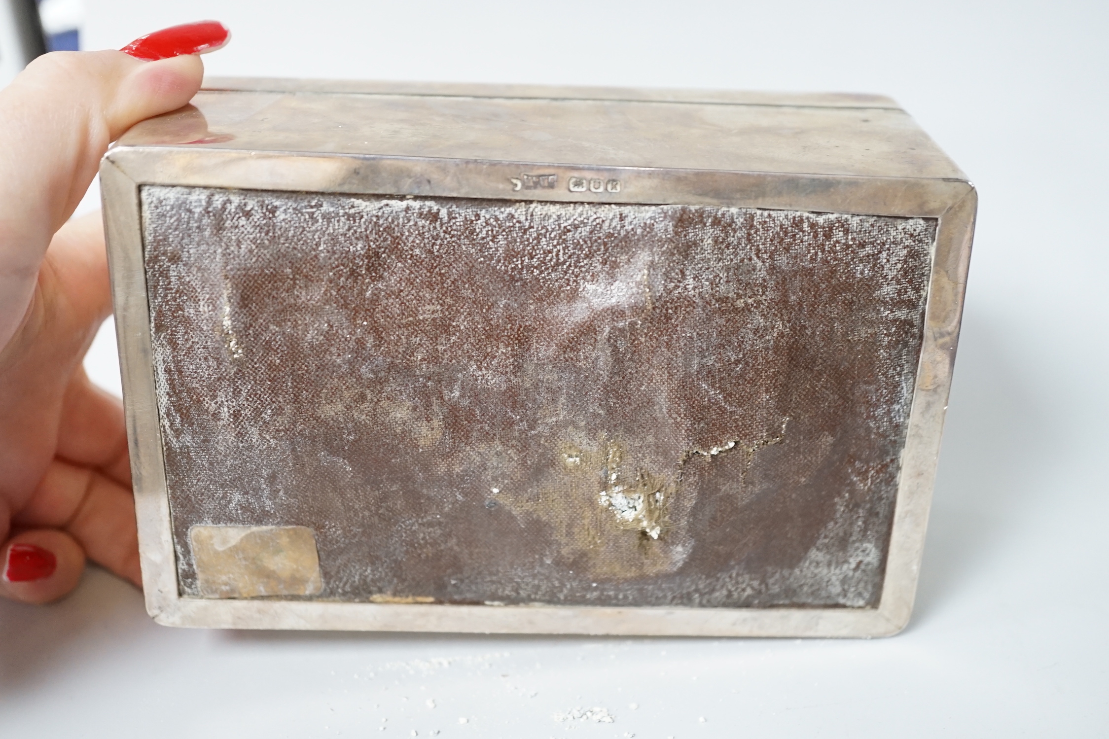 A George VI plain rectangular silver cigarette box with initials MJL, Mappin & Webb, London 1945, 14cm, gross 479 grams